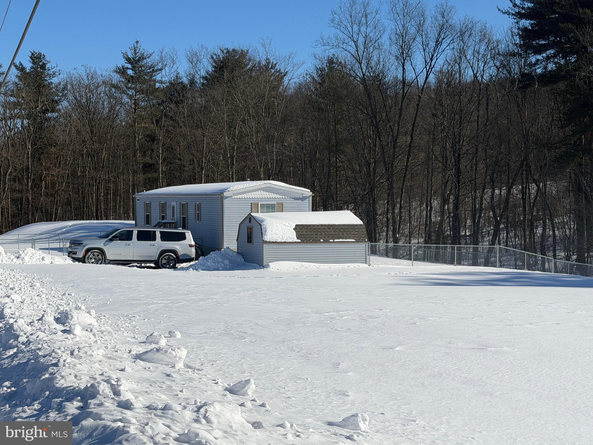 425 Cider Press Road Lock Haven, PA 17745 - Photo 8 of 38 a view of backyard with swimming pool and outdoor seating