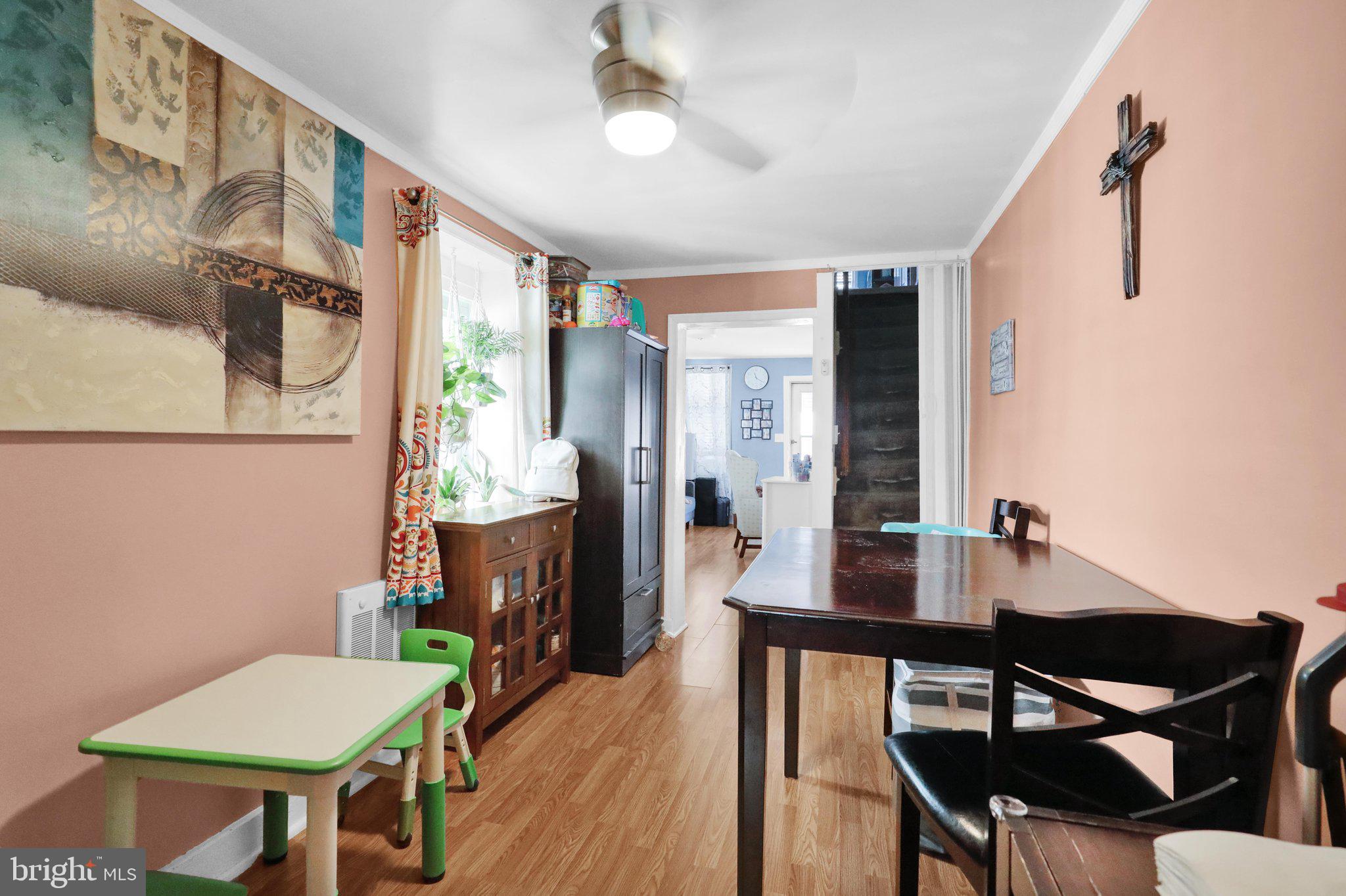 1122 Buttonwood Street Reading, PA 19604 - Photo 10 of 18 a view of a workspace with furniture and a potted plant