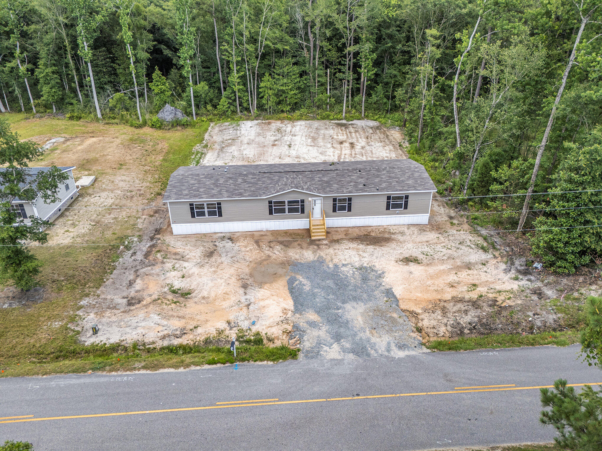 377 Horseshoe Road Moncks Corner, SC 29461 - Photo 30 of 35 004_dji_20240611150149_0112_d