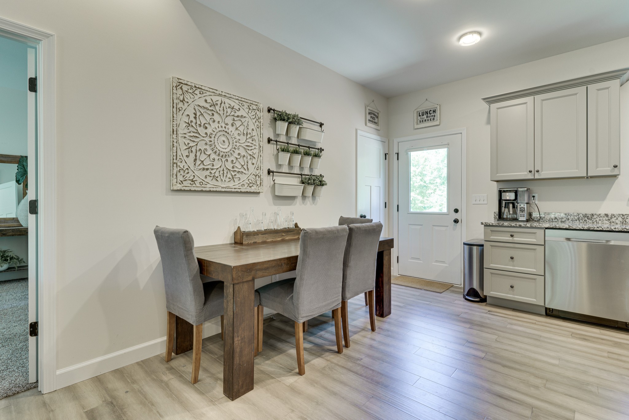 1170 Cowan Road Dickson, TN 37055 - Photo 15 of 30 a view of a dining room with furniture and wooden floor