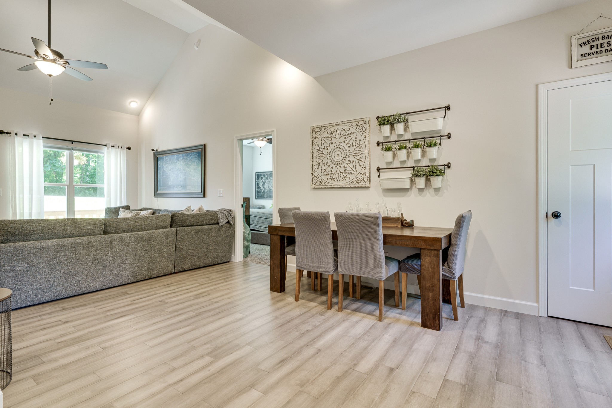 1170 Cowan Road Dickson, TN 37055 - Photo 16 of 30 a view of a dining room with furniture and wooden floor