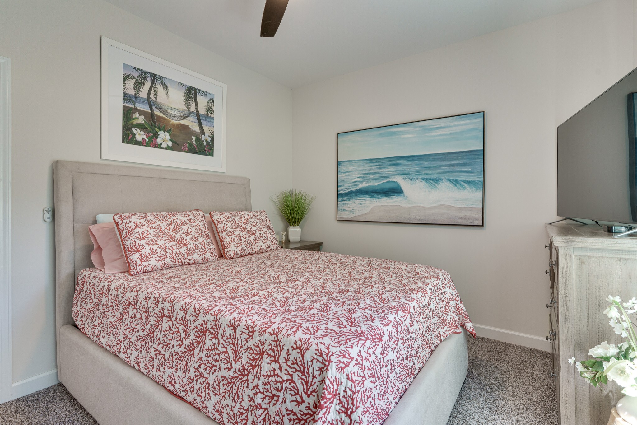 1170 Cowan Road Dickson, TN 37055 - Photo 21 of 30 a bedroom with a large bed and a chandelier