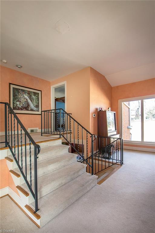 3333 Nottingham Road Winston-Salem, NC 27104 - Photo 4 of 25 Split-level stairs to landing and bedrooms on upper level.