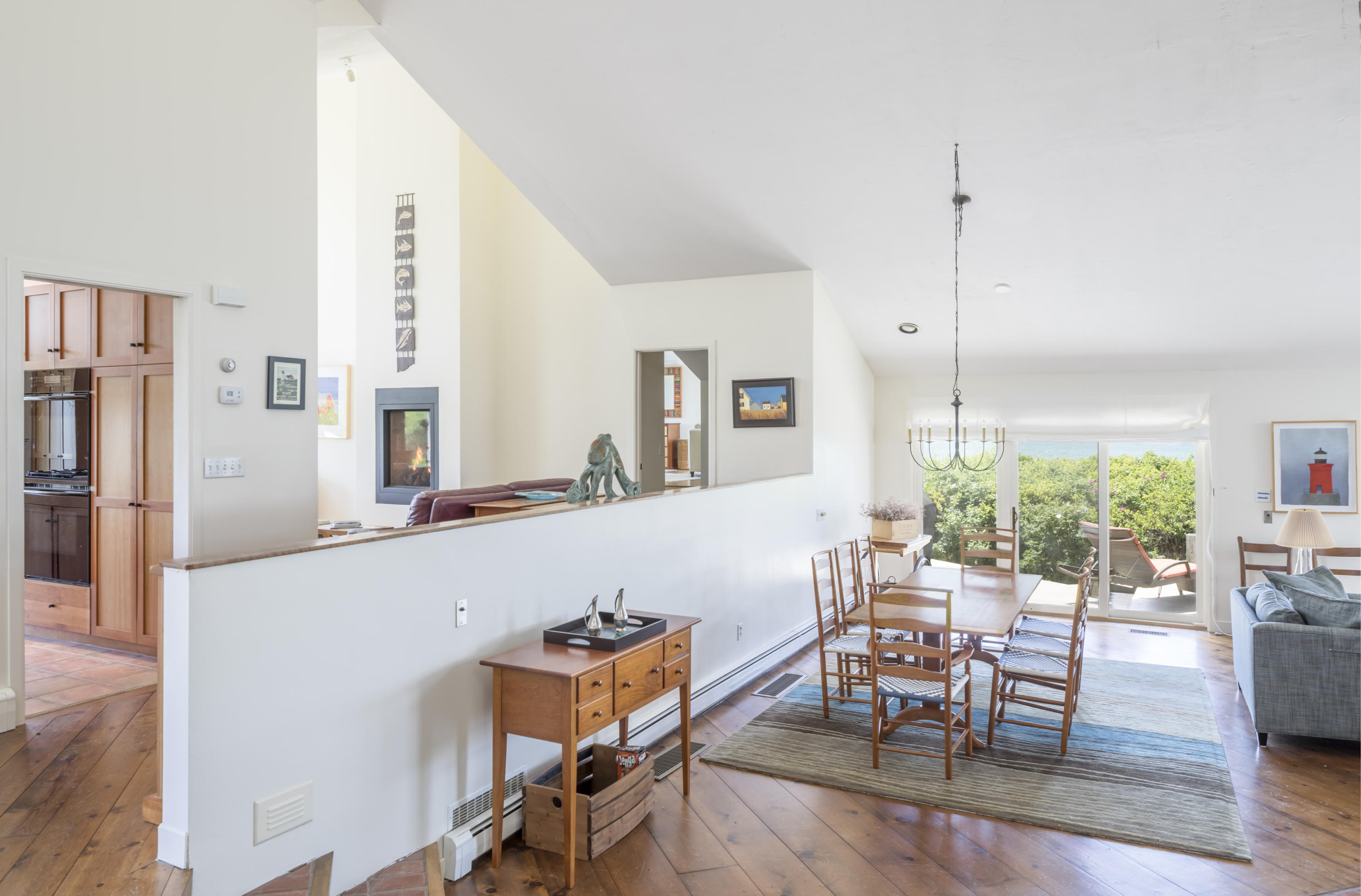 19 Avocet Road Truro, MA 02666 - Photo 9 of 26 a living room with furniture and a large window