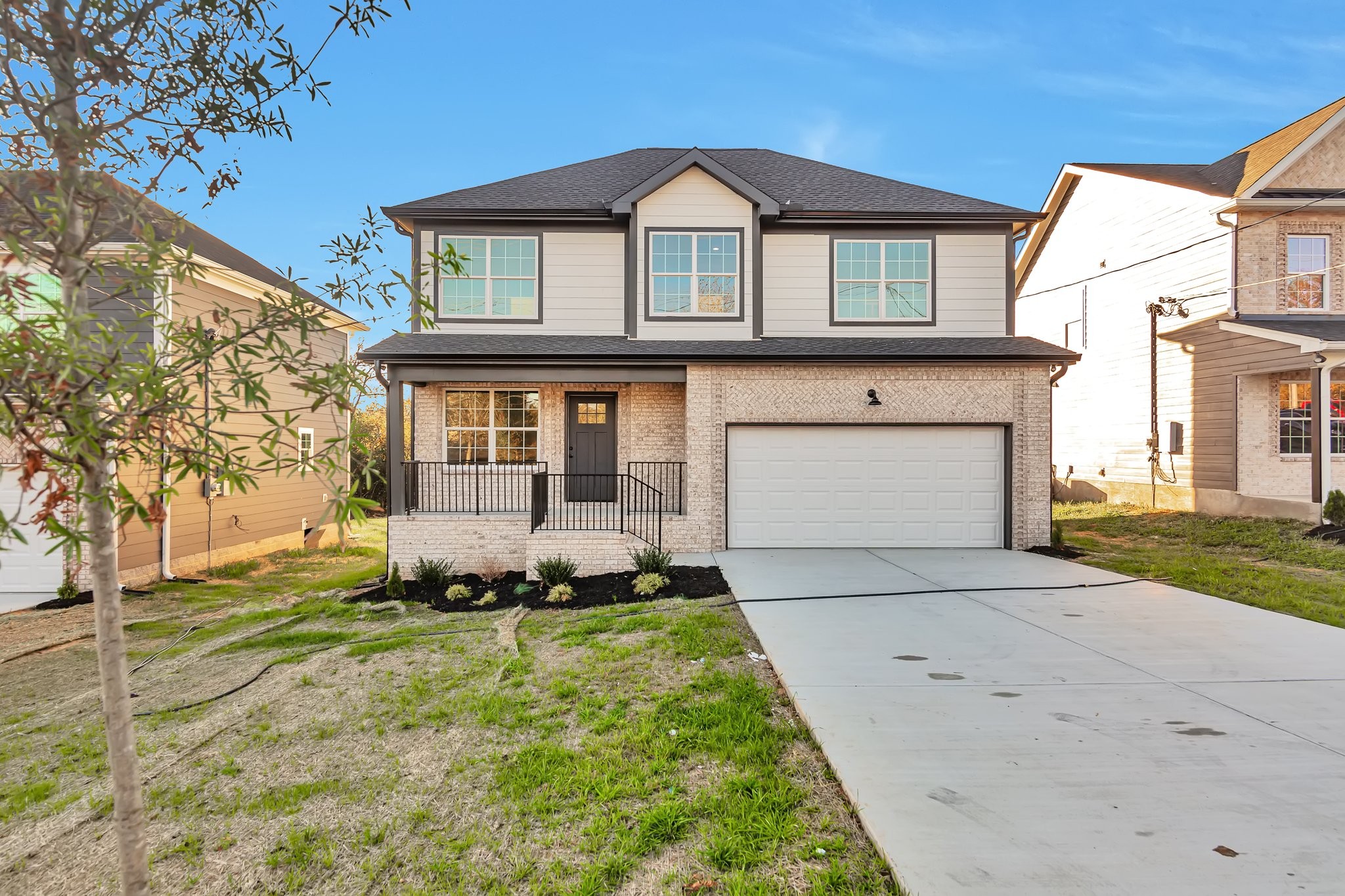 a front view of a house with a yard