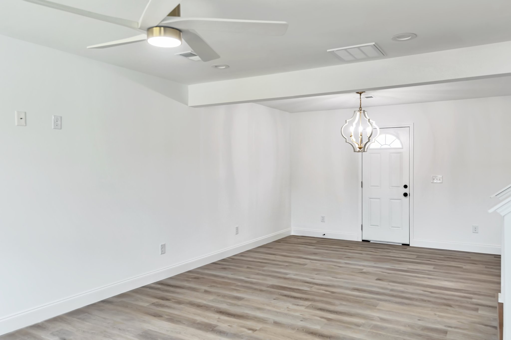 420 Larkin Springs Road Madison, TN 37115 - Photo 23 of 27 an empty room with wooden floor a ceiling fan and wooden floor