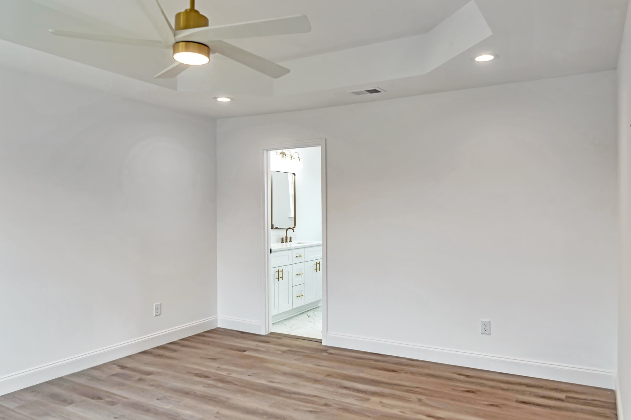 420 Larkin Springs Road Madison, TN 37115 - Photo 26 of 27 an empty room with wooden floor and windows