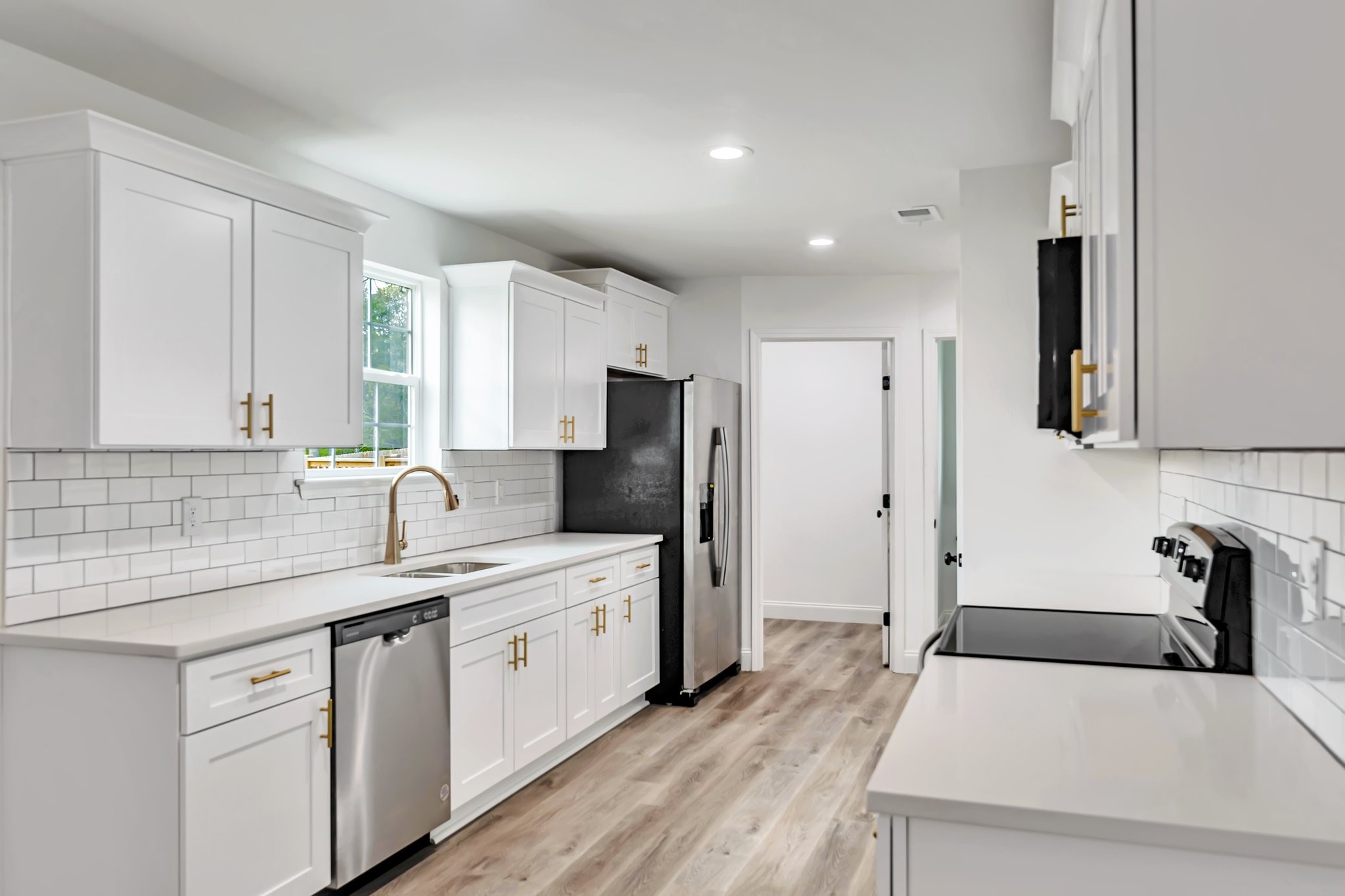 420 Larkin Springs Road Madison, TN 37115 - Photo 6 of 27 a kitchen with a sink appliances and cabinets