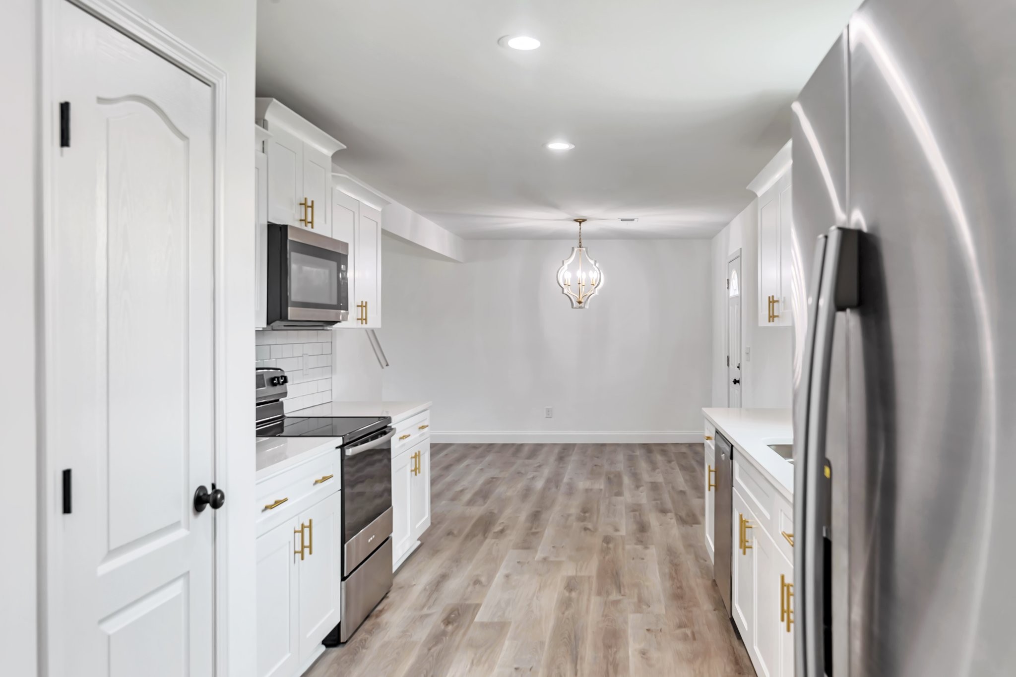 420 Larkin Springs Road Madison, TN 37115 - Photo 8 of 27 a kitchen with stainless steel appliances a refrigerator sink and microwave