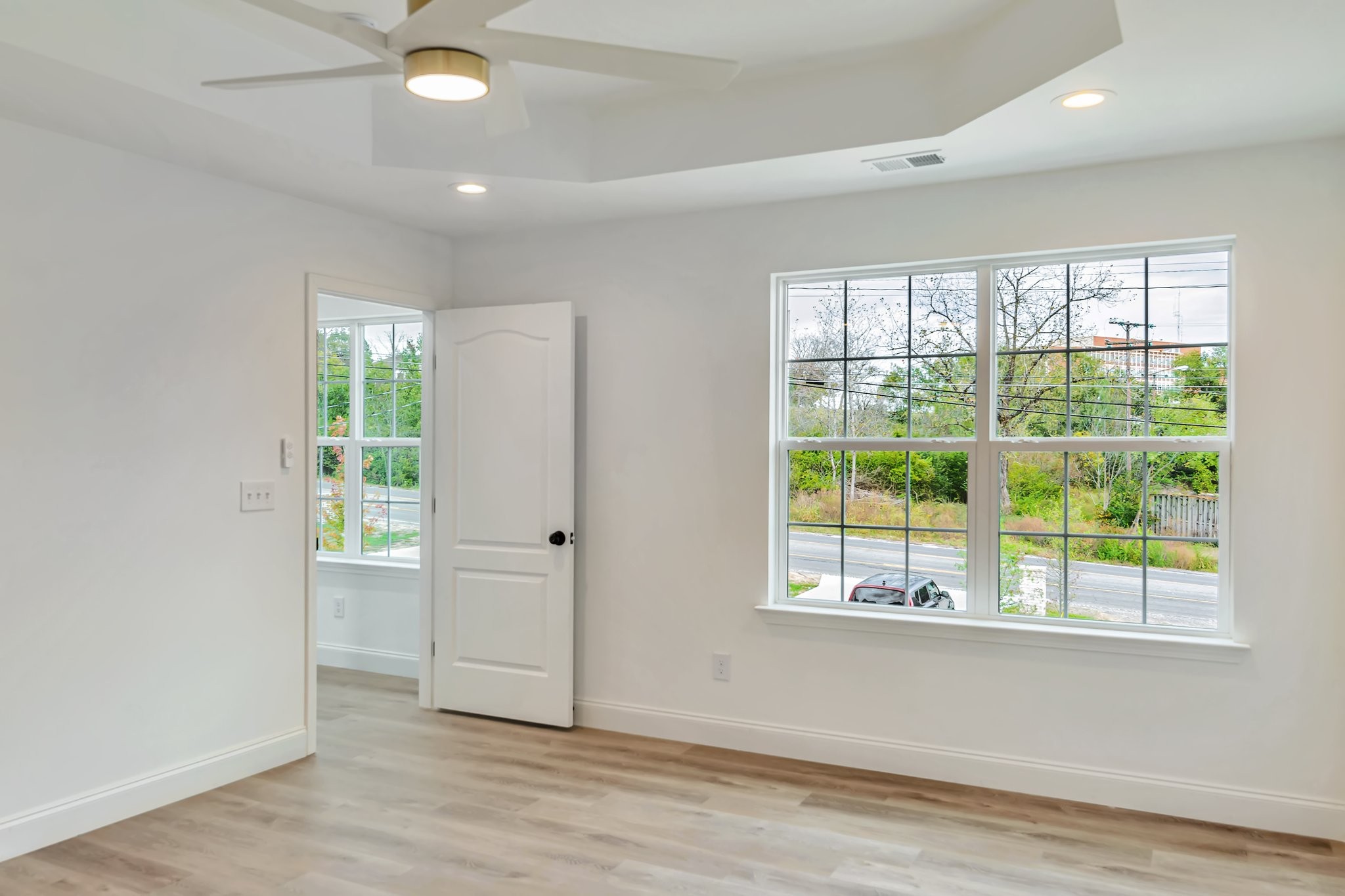 420 Larkin Springs Road Madison, TN 37115 - Photo 9 of 27 wooden floor in an empty room with a window