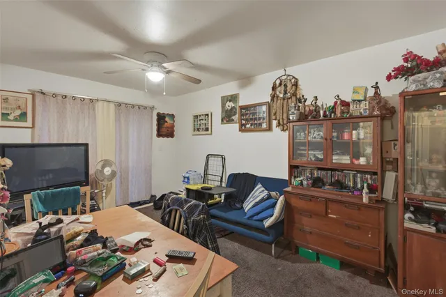 a bedroom with furniture and a fireplace