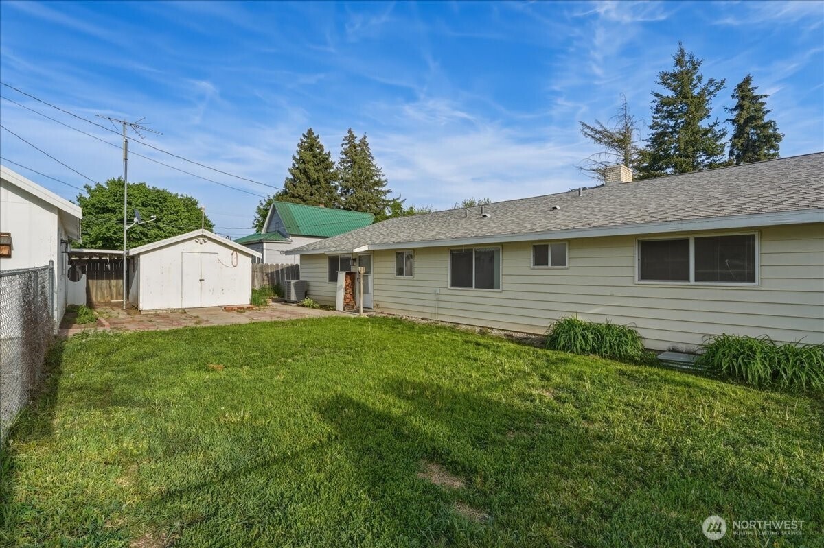 309 West Walnut Street Waterville, WA 98858 - Photo 20 of 28 a view of a backyard with plants and a garden