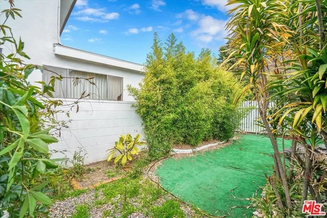 a view of yard with seating space