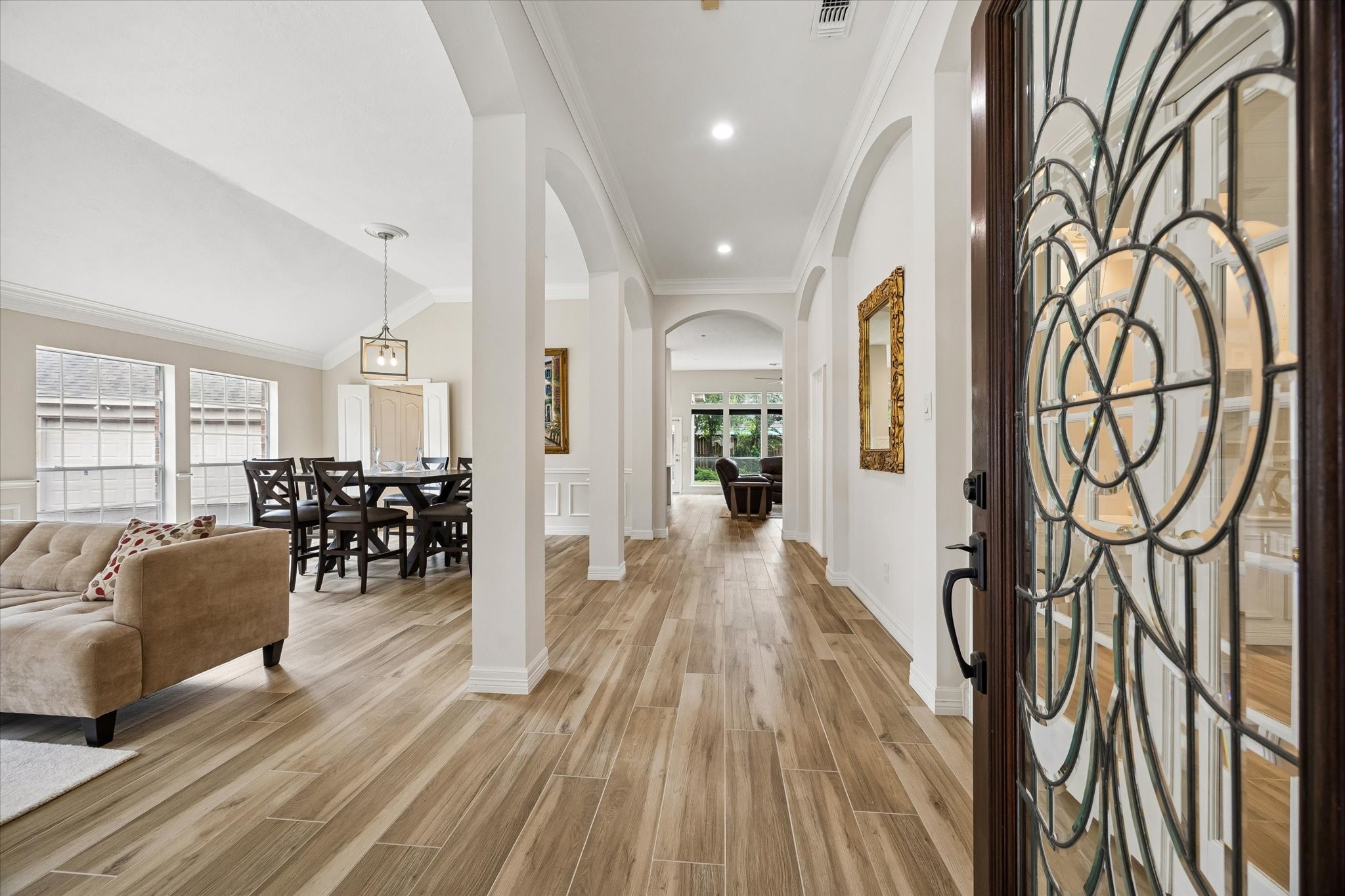 5306 Summerland Ridge Court Houston, TX 77041 - Photo 2 of 33 a living room with furniture and wooden floor