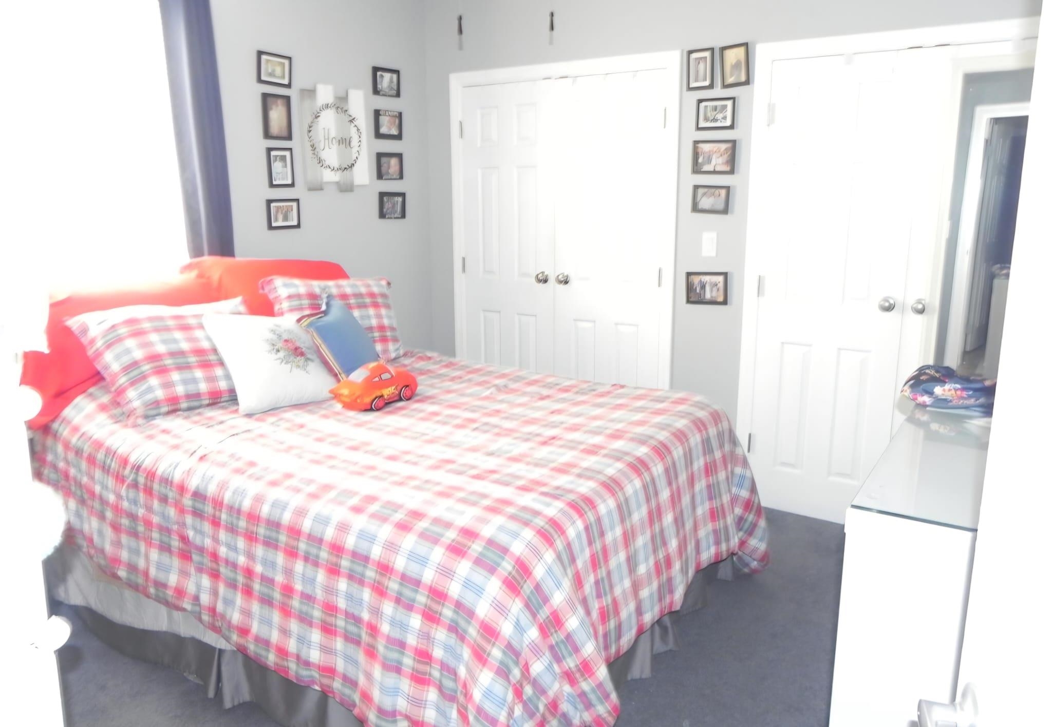 114 Mehrhof Road Little Ferry, NJ 07643 - Photo 11 of 28 a bedroom with a bed and a window