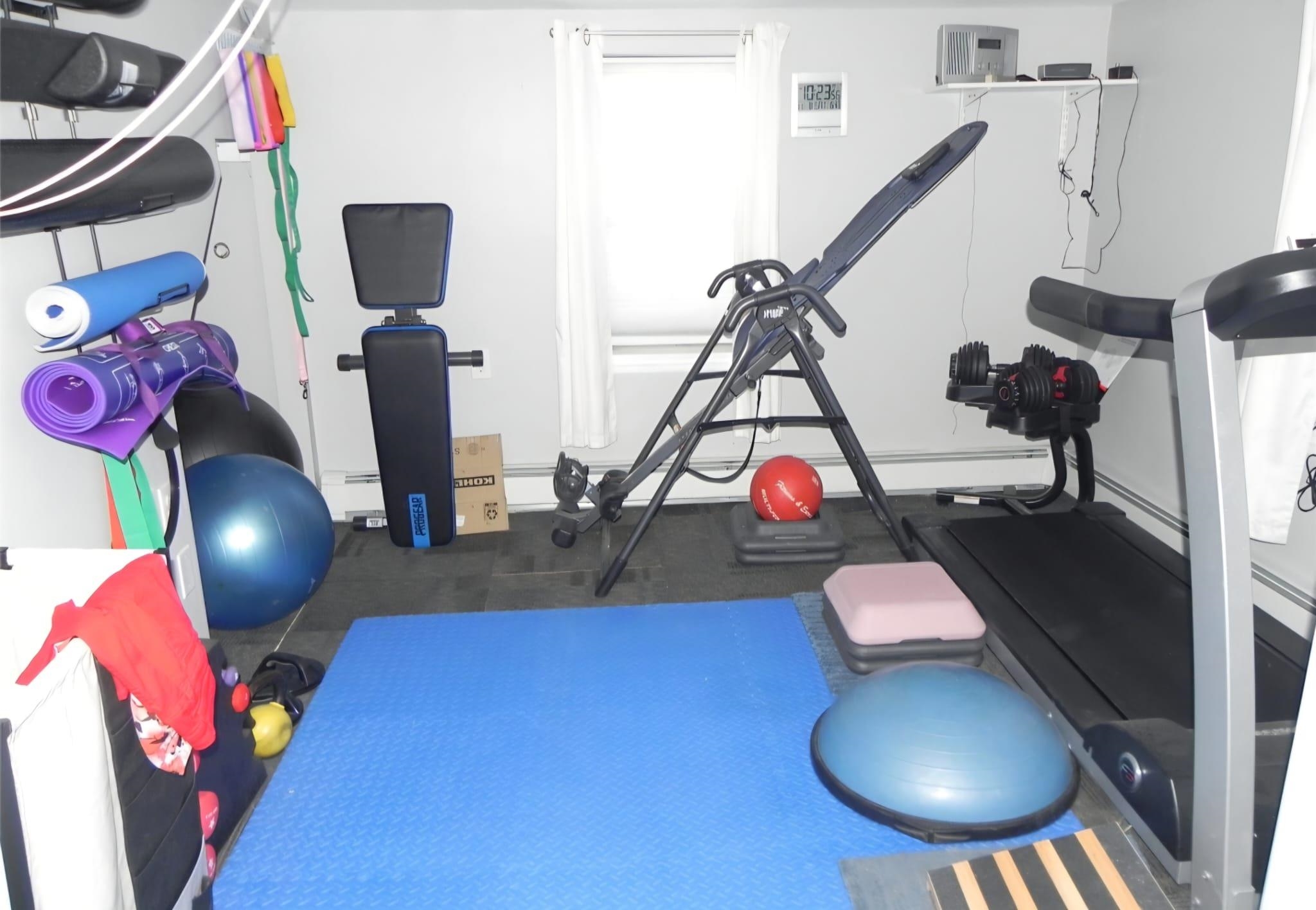 114 Mehrhof Road Little Ferry, NJ 07643 - Photo 13 of 28 a room with gym equipment