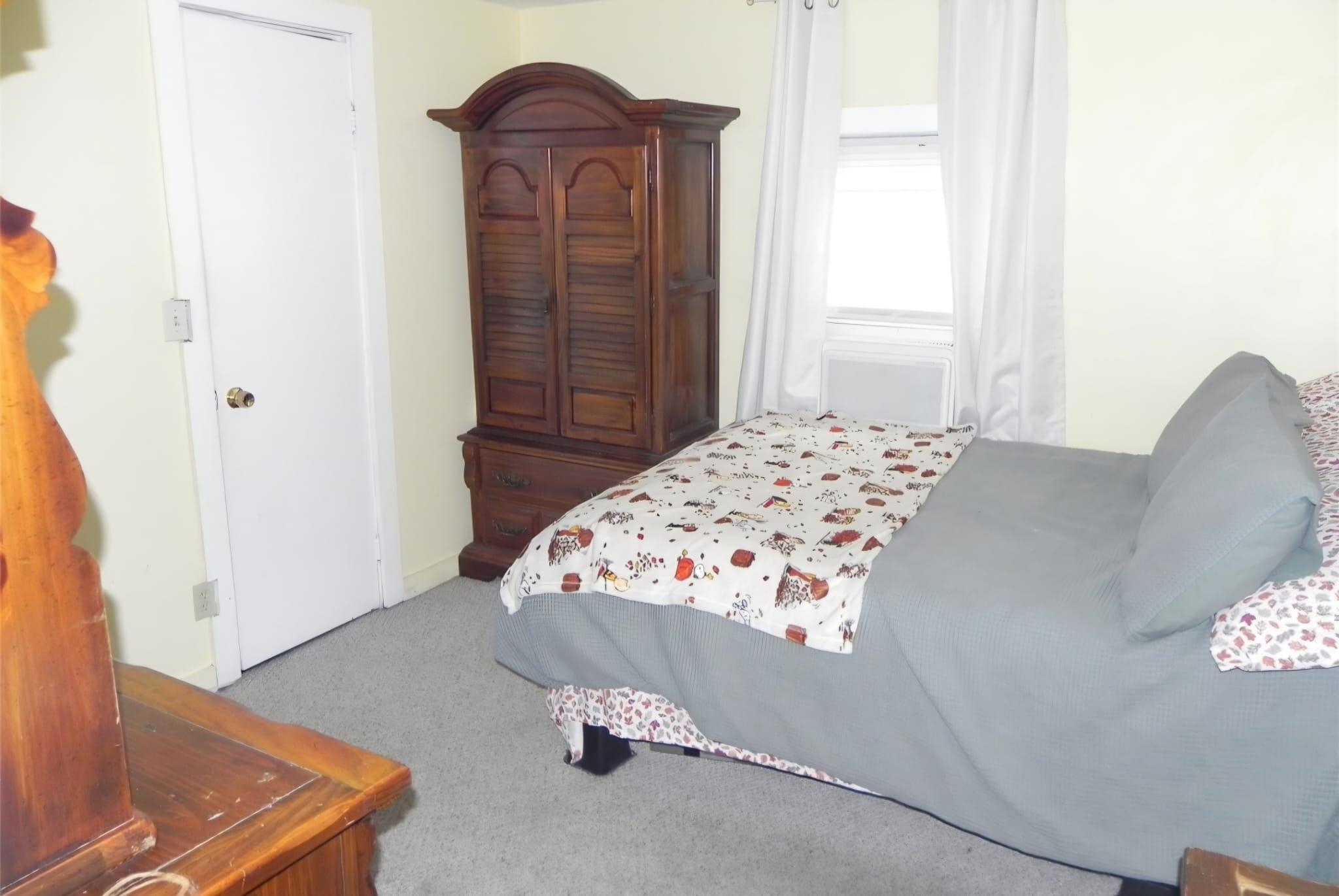 114 Mehrhof Road Little Ferry, NJ 07643 - Photo 23 of 28 a bedroom with a bed and a window