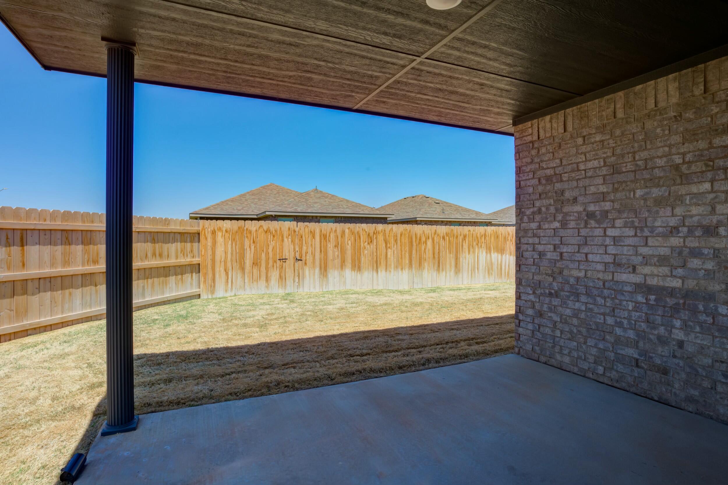 6928 11th Street Lubbock, TX 79416 - Photo 38 of 42 a view of a room next to a large window