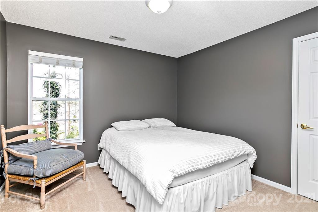 883 Knightsbridge Road Fort Mill, SC 29708 - Photo 13 of 20 a bedroom with a bed and a window