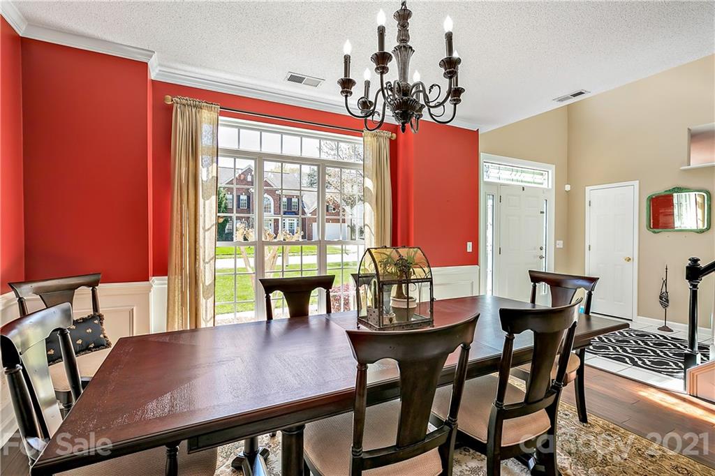 883 Knightsbridge Road Fort Mill, SC 29708 - Photo 3 of 20 a view of a dining room with furniture window and outside view