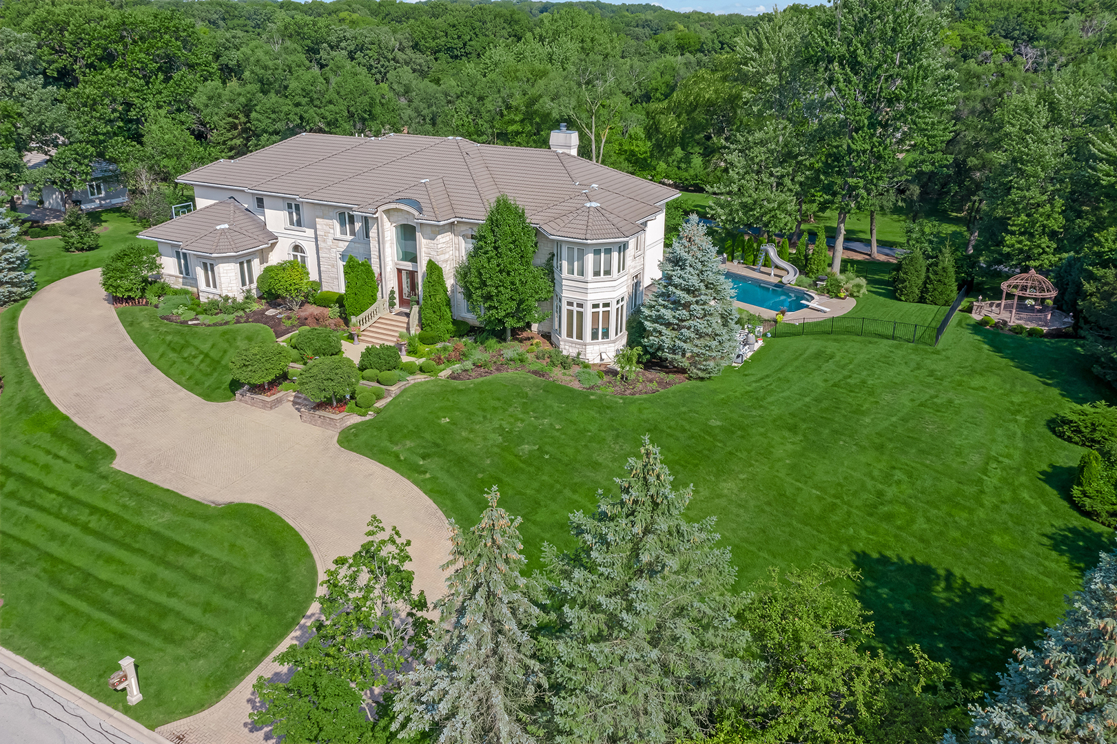 21 Ashton Drive Burr Ridge, IL 60527 - Photo 2 of 45 a view of house with garden space and street view