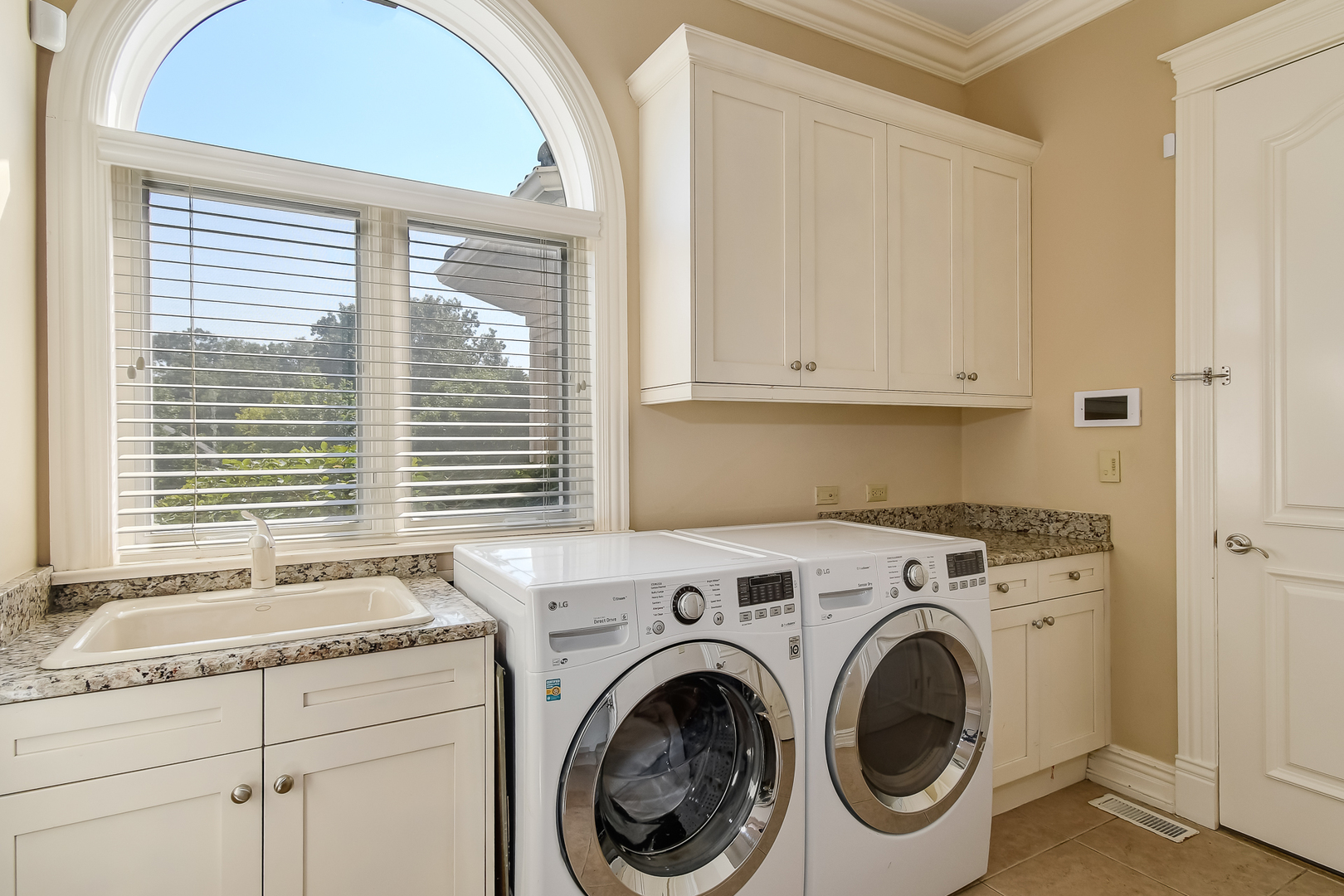 21 Ashton Drive Burr Ridge, IL 60527 - Photo 11 of 45 a view of a kitchen with washer and dryer