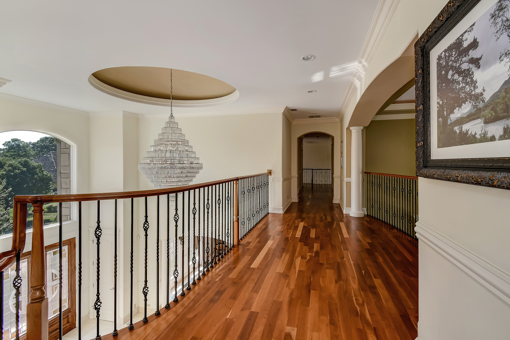 21 Ashton Drive Burr Ridge, IL 60527 - Photo 14 of 45 a view of a hallway with wooden floor and front door
