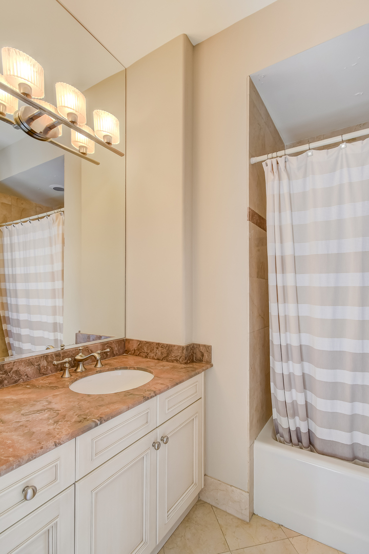 21 Ashton Drive Burr Ridge, IL 60527 - Photo 18 of 45 a bathroom with a granite countertop sink and a mirror