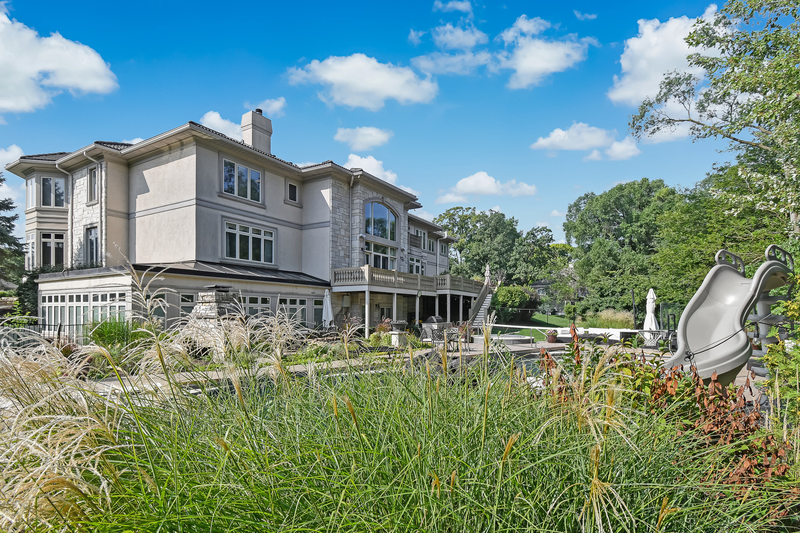 21 Ashton Drive Burr Ridge, IL 60527 - Photo 40 of 45 a view of a lake with a house