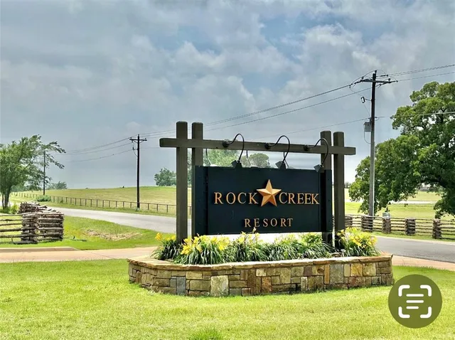 a view of a park with welcome board