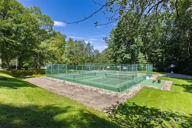 a view of a golf course with a lake