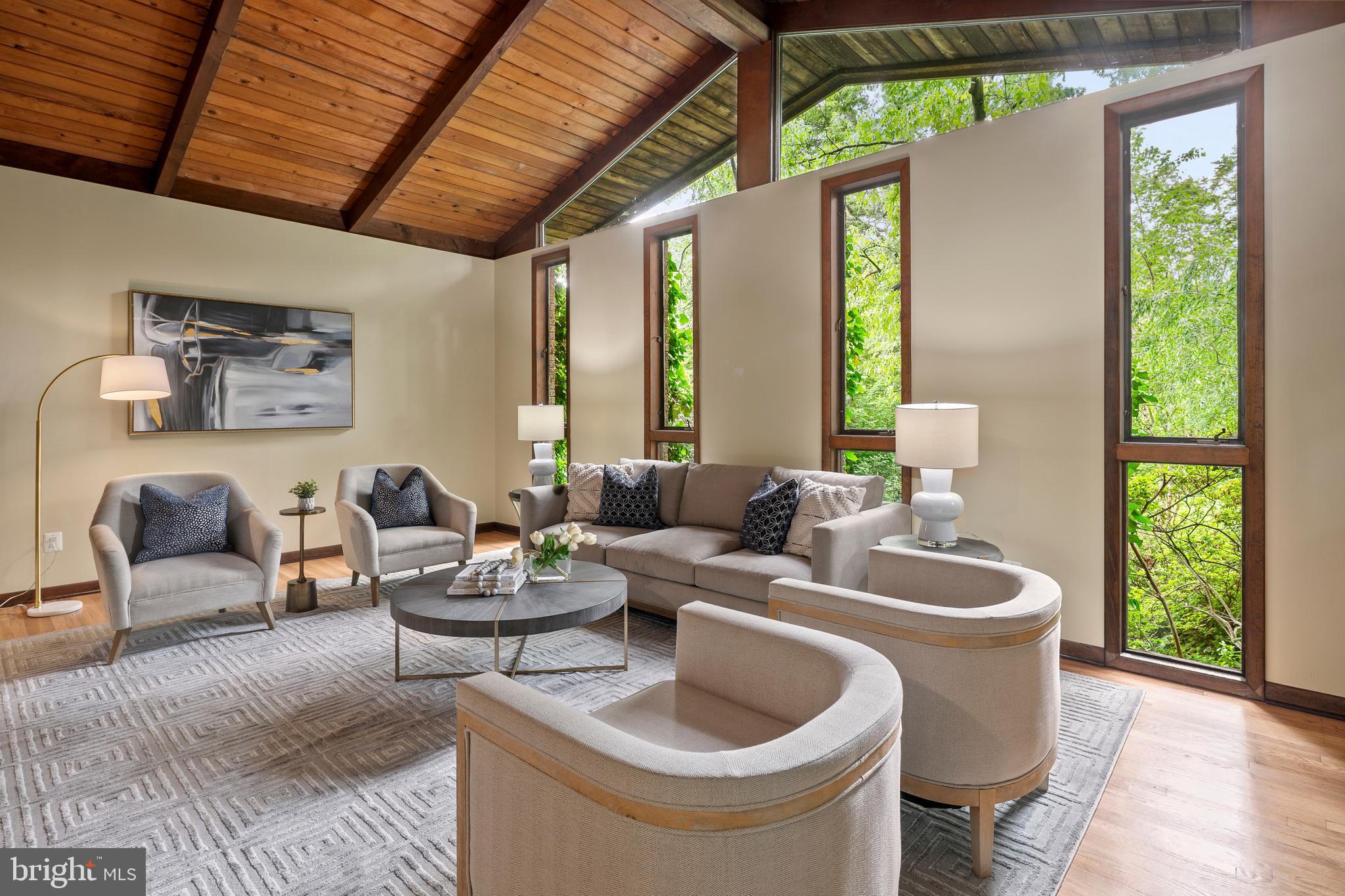 2825 Lorcom Lane Arlington, VA 22207 - Photo 12 of 63 a living room with furniture and a large window