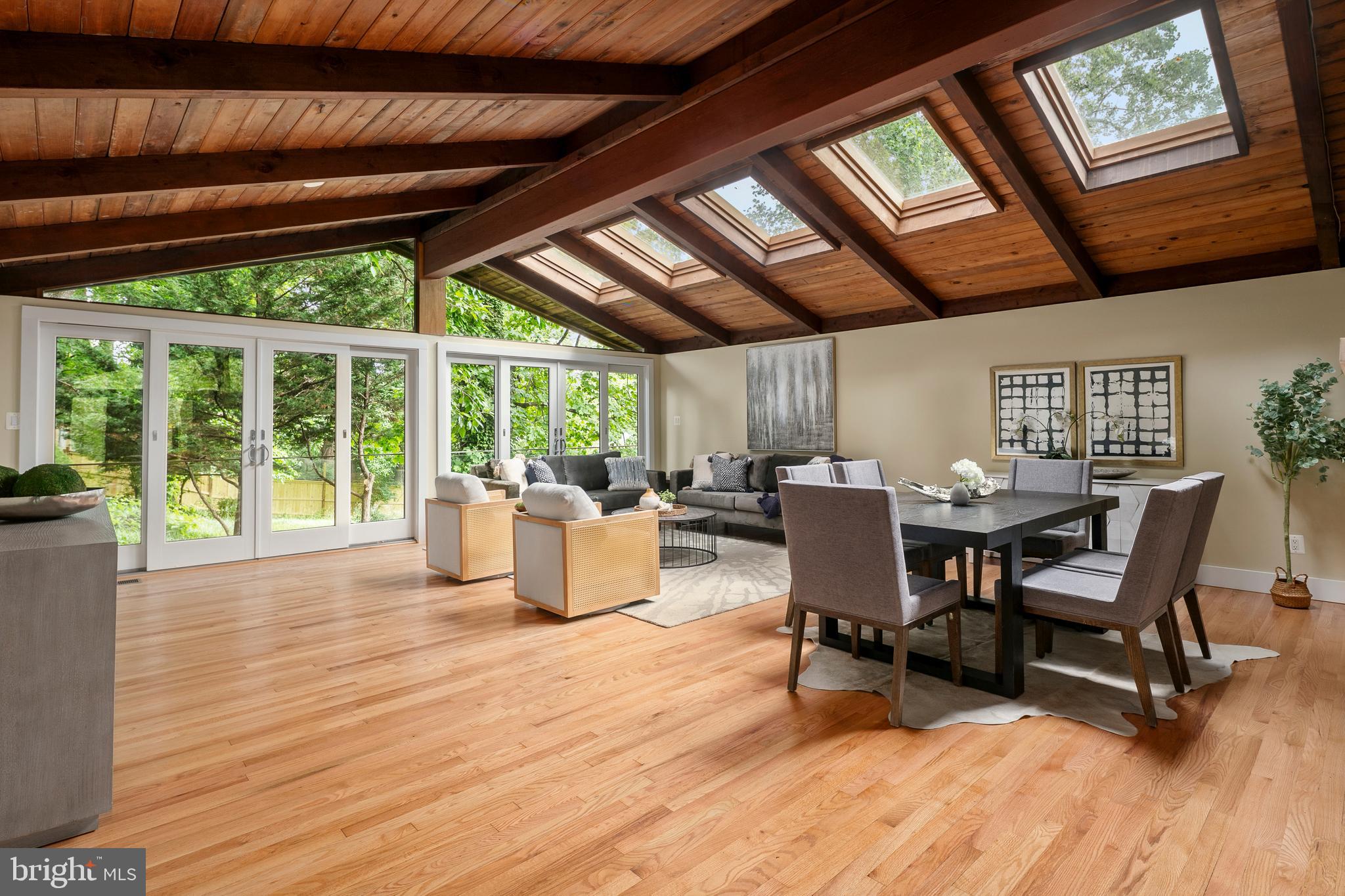 2825 Lorcom Lane Arlington, VA 22207 - Photo 21 of 63 a dining room with furniture wooden floor and a rug