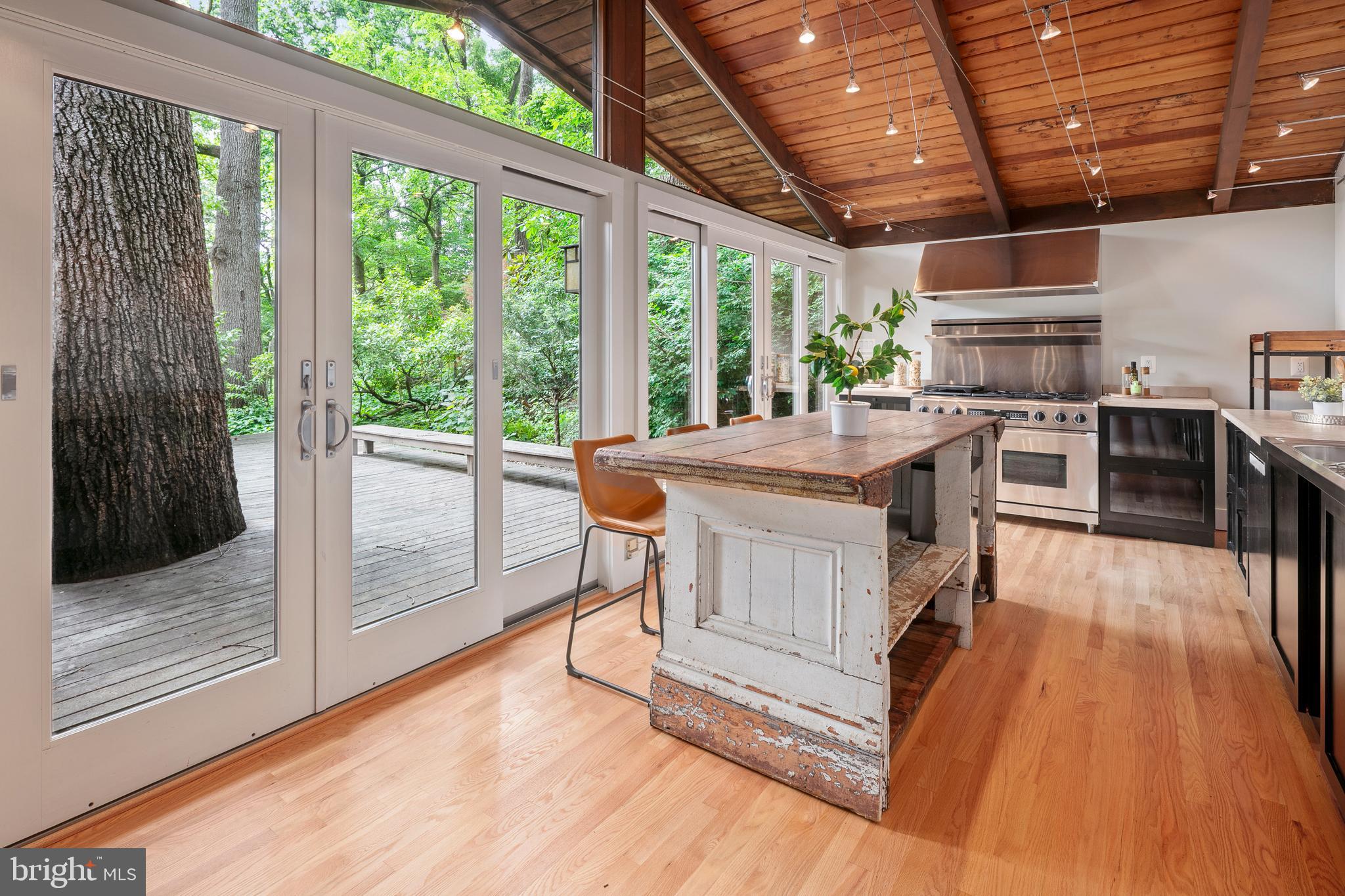 2825 Lorcom Lane Arlington, VA 22207 - Photo 36 of 63 a view of a kitchen with a sink and wooden floor