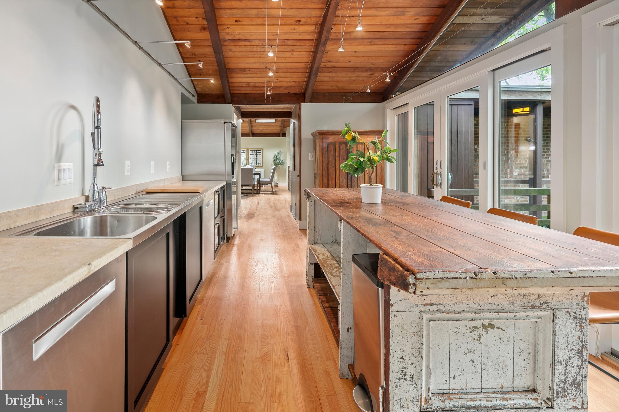 2825 Lorcom Lane Arlington, VA 22207 - Photo 41 of 63 a dining hall with stainless steel appliances granite countertop lots of counter top space