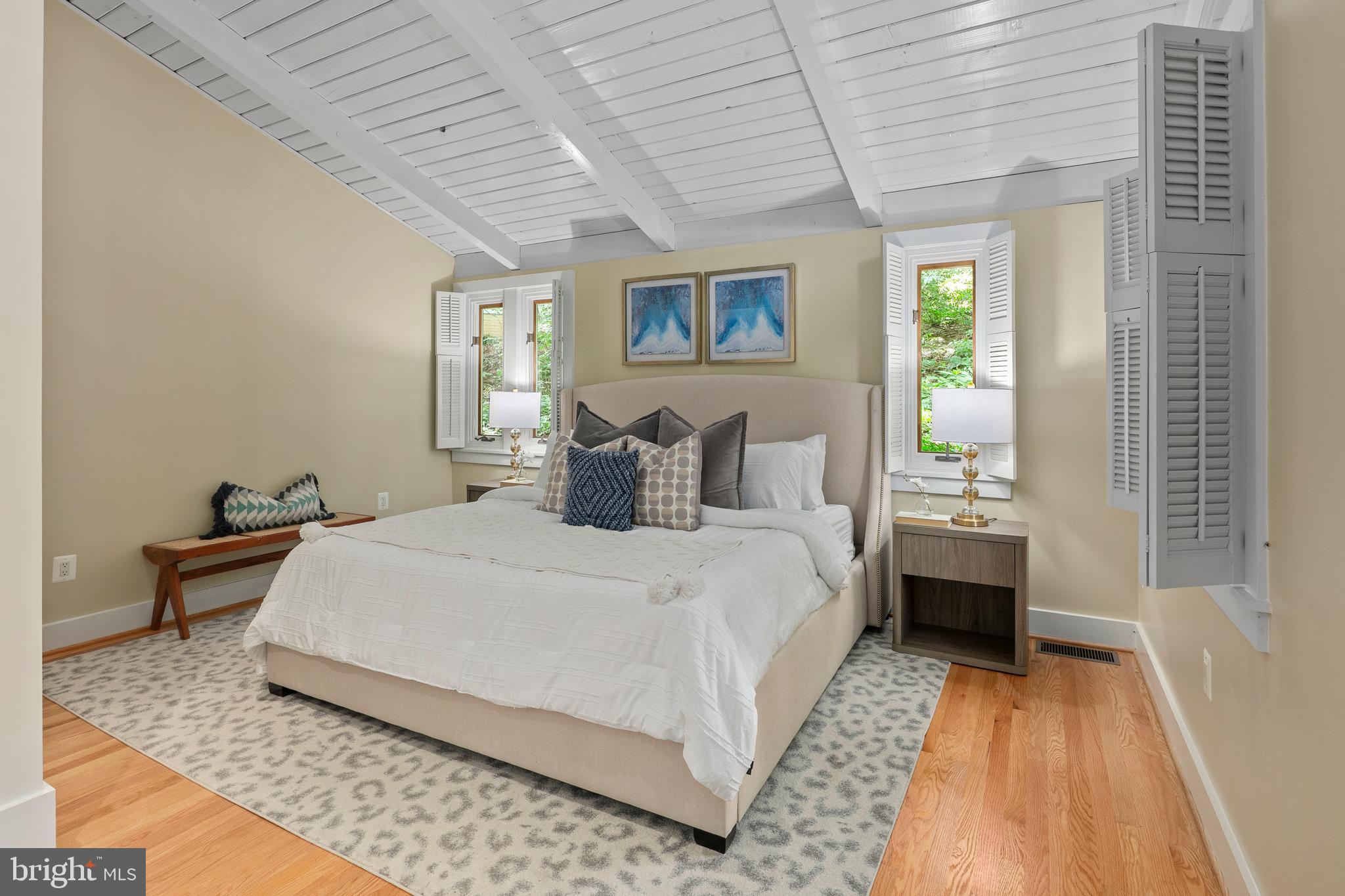 2825 Lorcom Lane Arlington, VA 22207 - Photo 45 of 63 a spacious bedroom with a bed and wooden floor