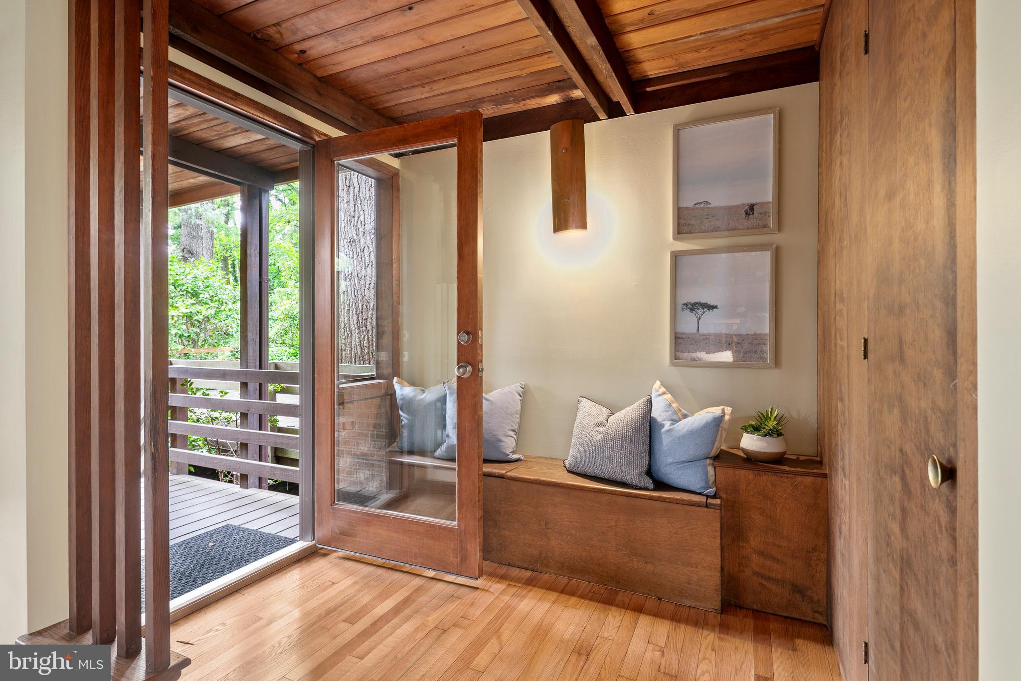 2825 Lorcom Lane Arlington, VA 22207 - Photo 7 of 63 a living room with furniture and a floor to ceiling window