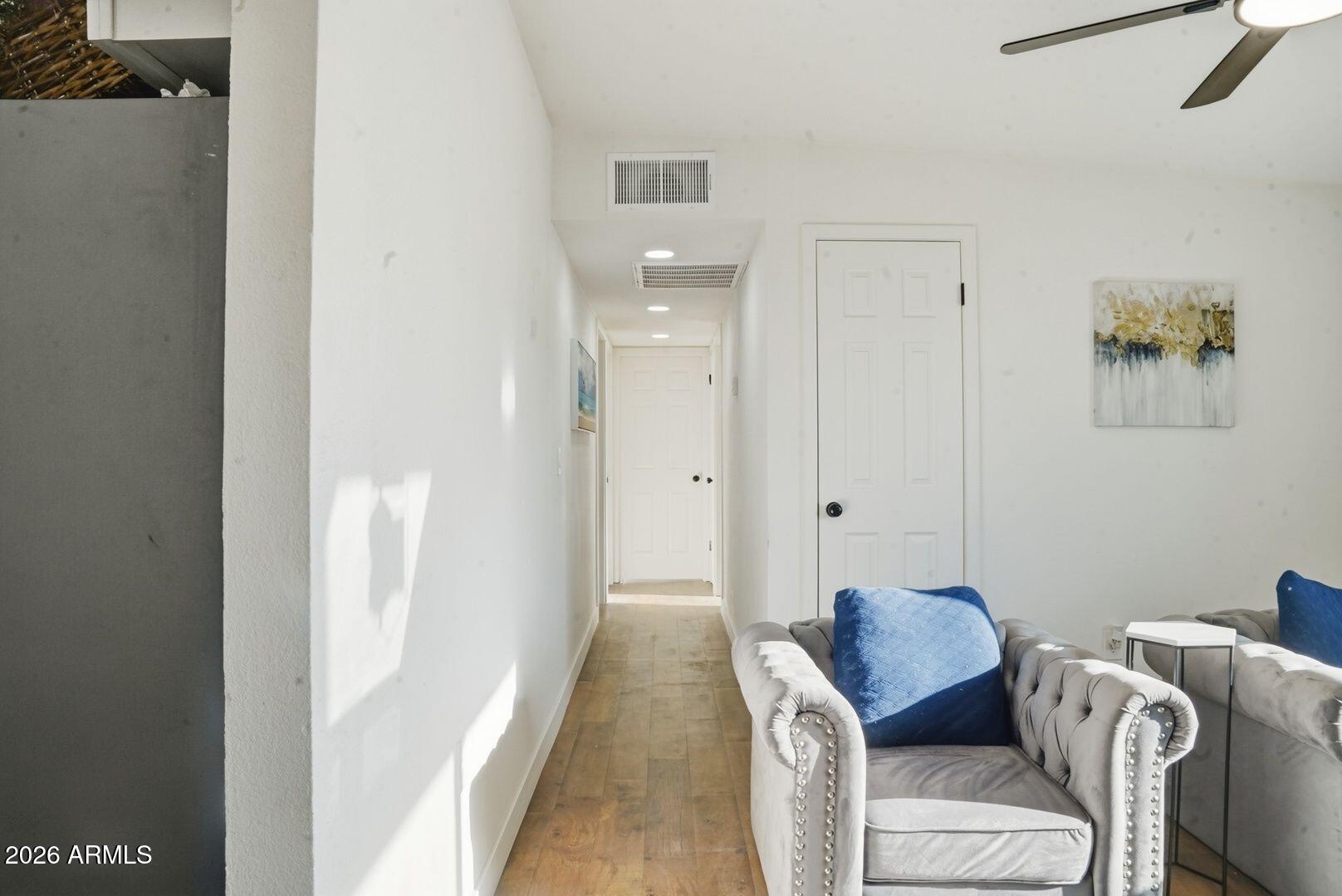 408 Hartford Road Kearny, AZ 85137 - Photo 12 of 27 a view of room with furniture and wooden floor