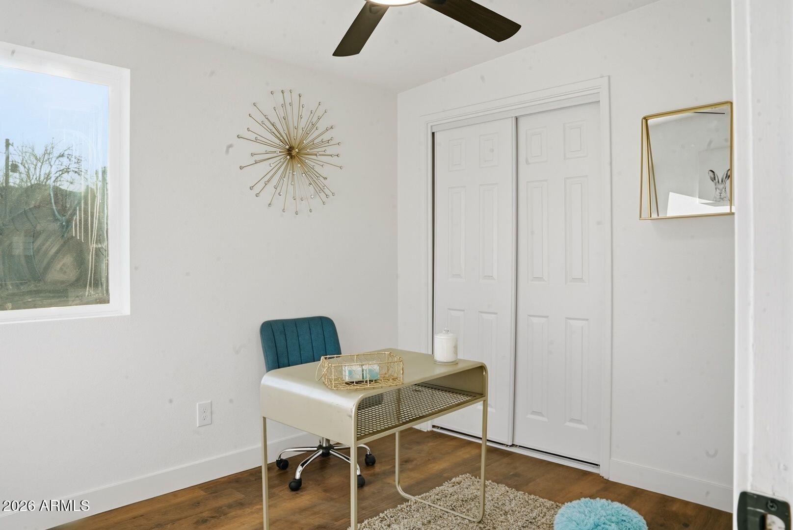 408 Hartford Road Kearny, AZ 85137 - Photo 16 of 27 a view of a workspace with furniture and wooden floor