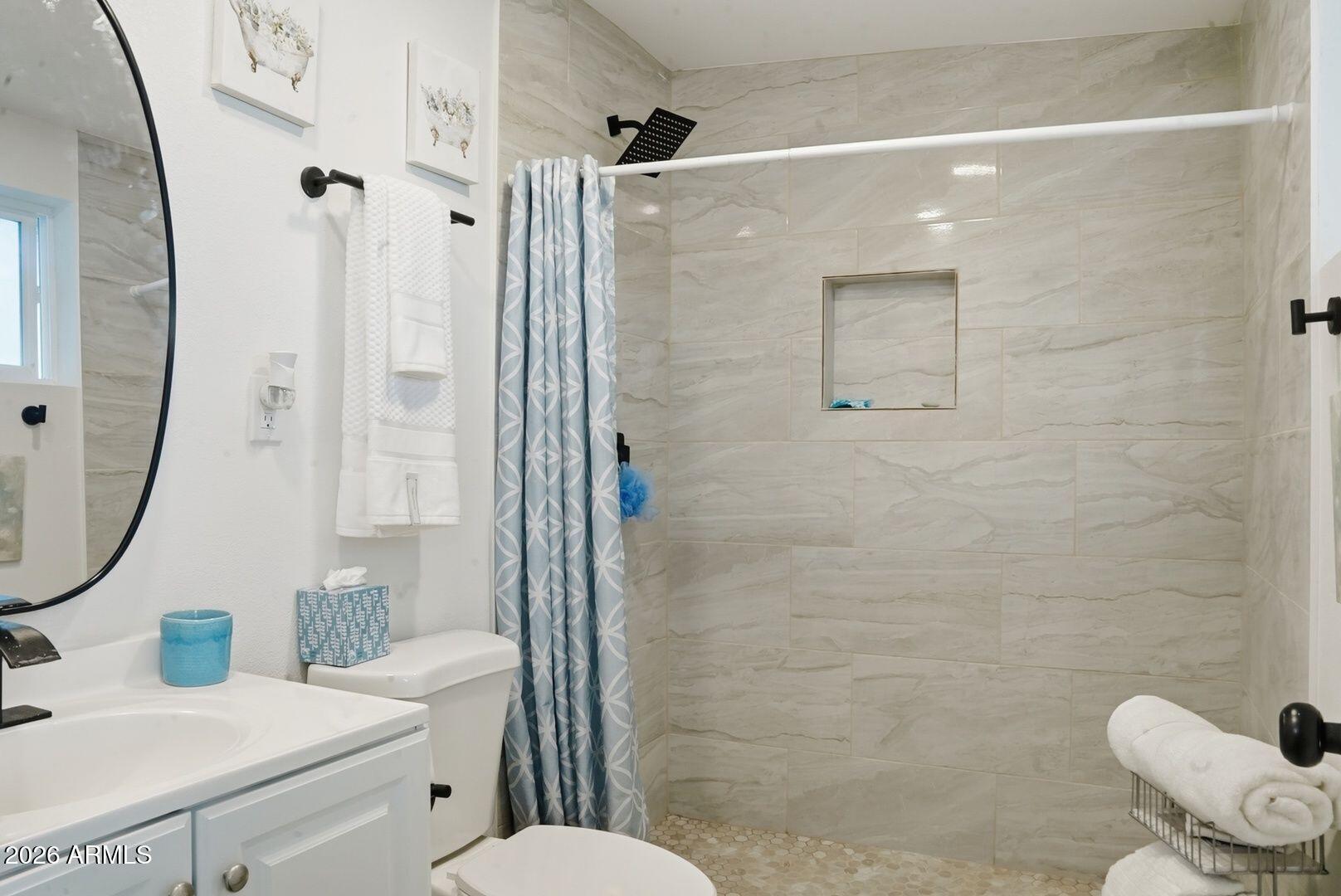 408 Hartford Road Kearny, AZ 85137 - Photo 24 of 27 a bathroom with a sink a toilet and shower