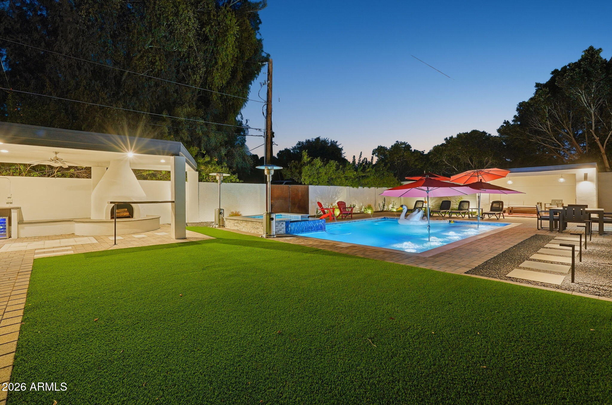 5149 North 34th Street Phoenix, AZ 85018 - Photo 60 of 70 a view of yard with swimming pool and green space