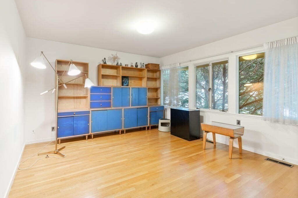 7 Leeland Terrace Lexington, MA 02421 - Photo 14 of 32 a bedroom with a bed and a window