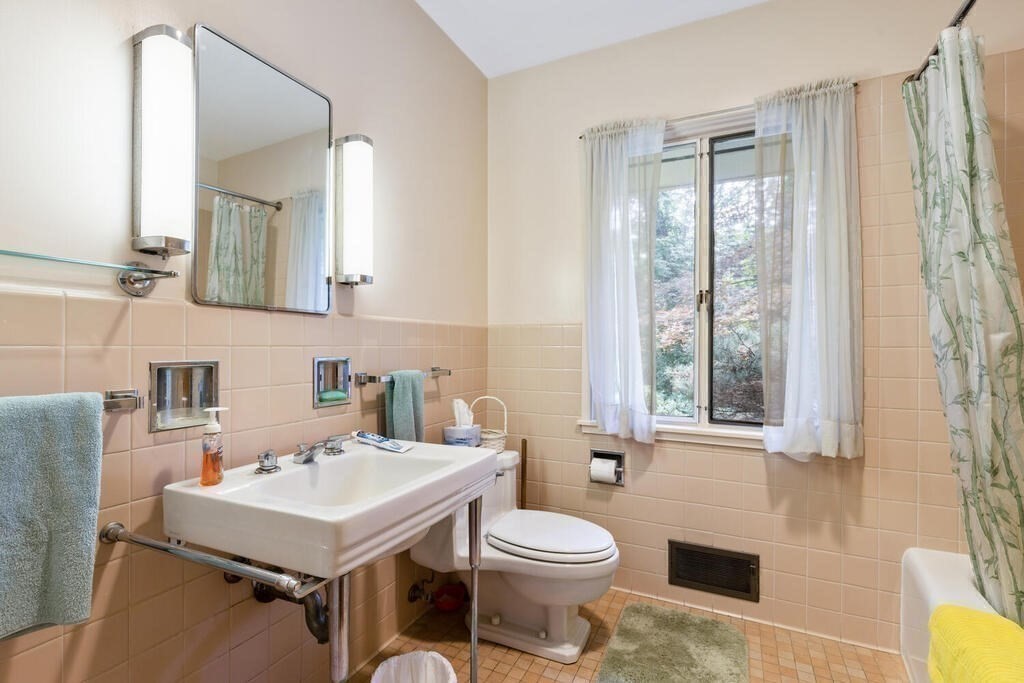 7 Leeland Terrace Lexington, MA 02421 - Photo 17 of 32 a bathroom with a sink toilet and mirror