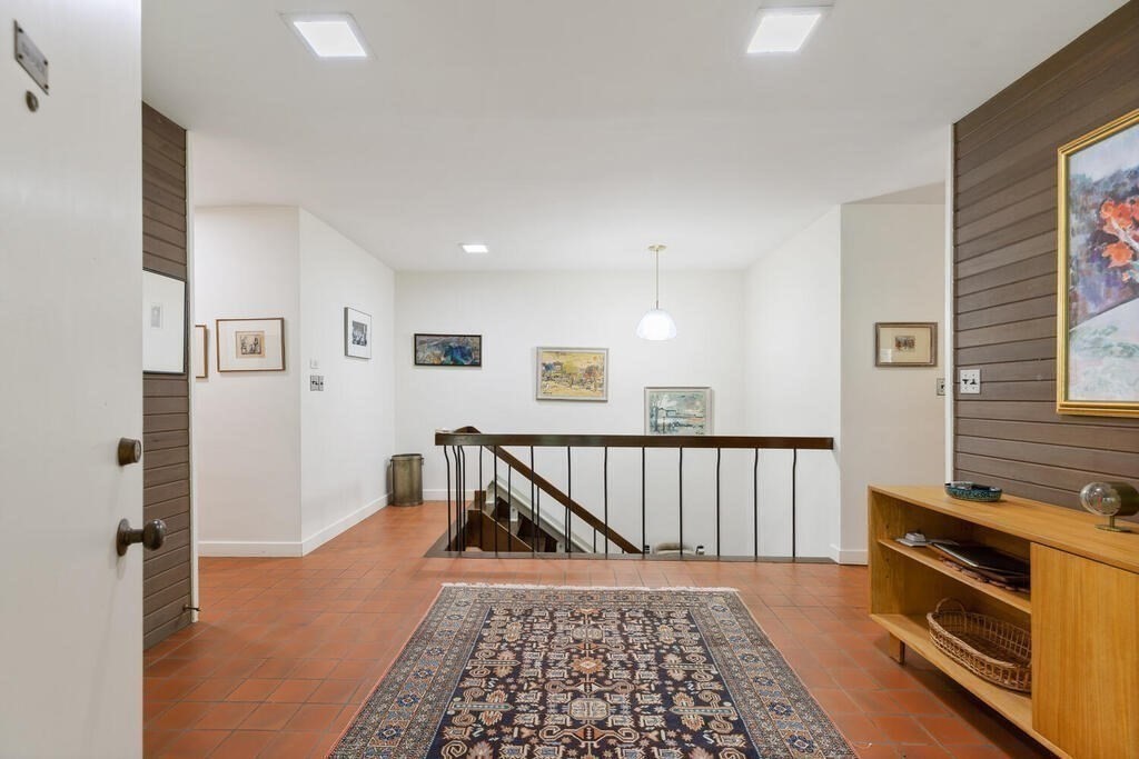 7 Leeland Terrace Lexington, MA 02421 - Photo 21 of 32 a view of a livingroom with furniture and staircase