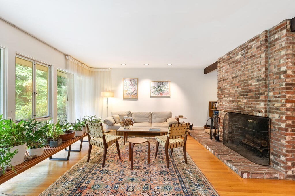 7 Leeland Terrace Lexington, MA 02421 - Photo 4 of 32 a living room with furniture and a fireplace