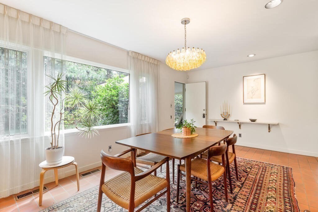 7 Leeland Terrace Lexington, MA 02421 - Photo 8 of 32 a view of a dining room with furniture wooden floor and chandelier