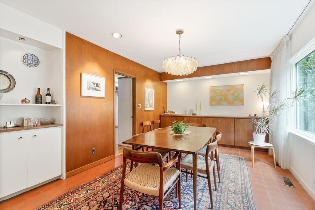 7 Leeland Terrace Lexington, MA 02421 - Photo 9 of 32 a view of a dining room with furniture and chandelier