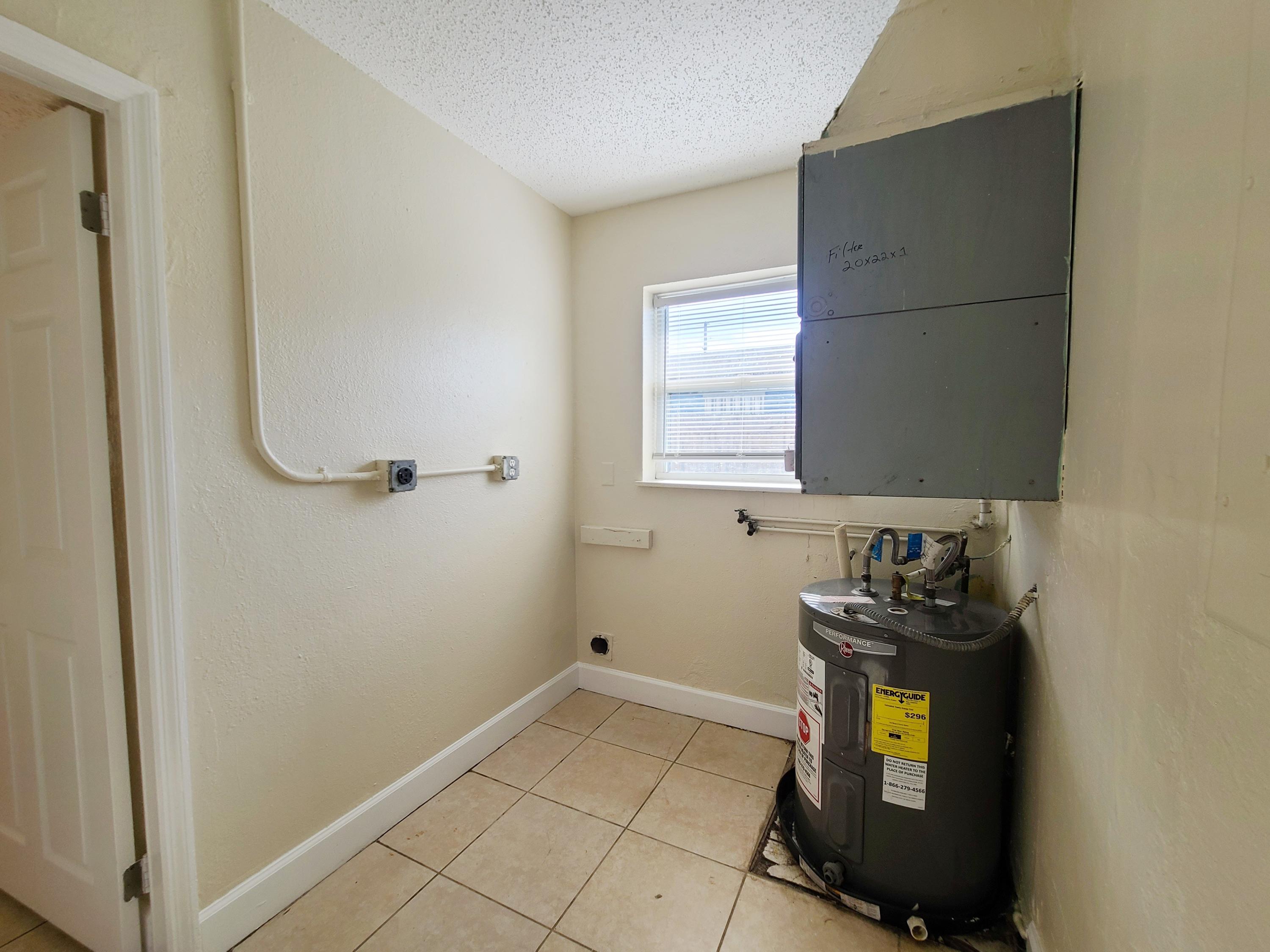 146 West 17th Street Riviera Beach, FL 33404 - Photo 11 of 18 Laundry Room