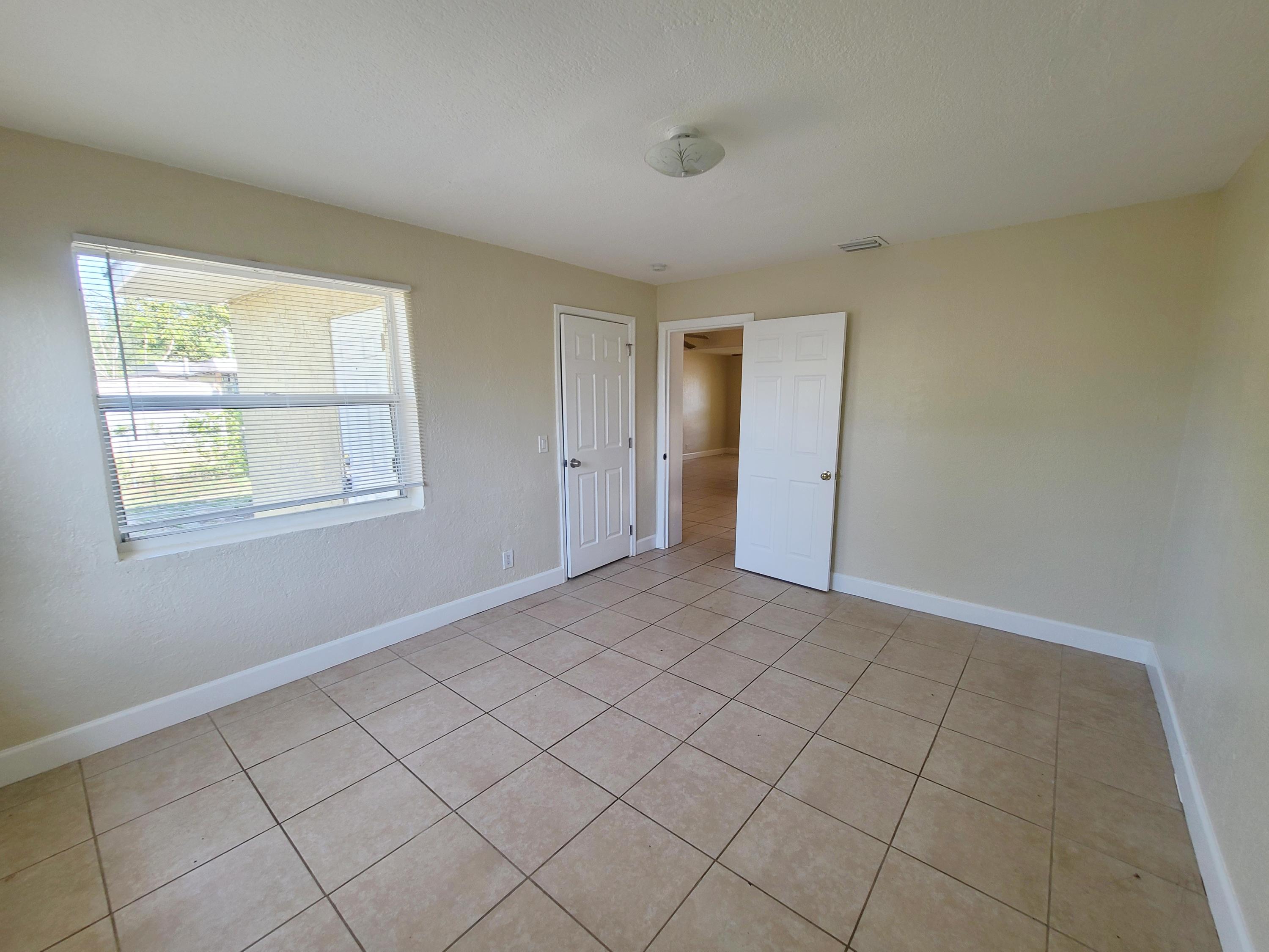 146 West 17th Street Riviera Beach, FL 33404 - Photo 14 of 18 Bedroom 3