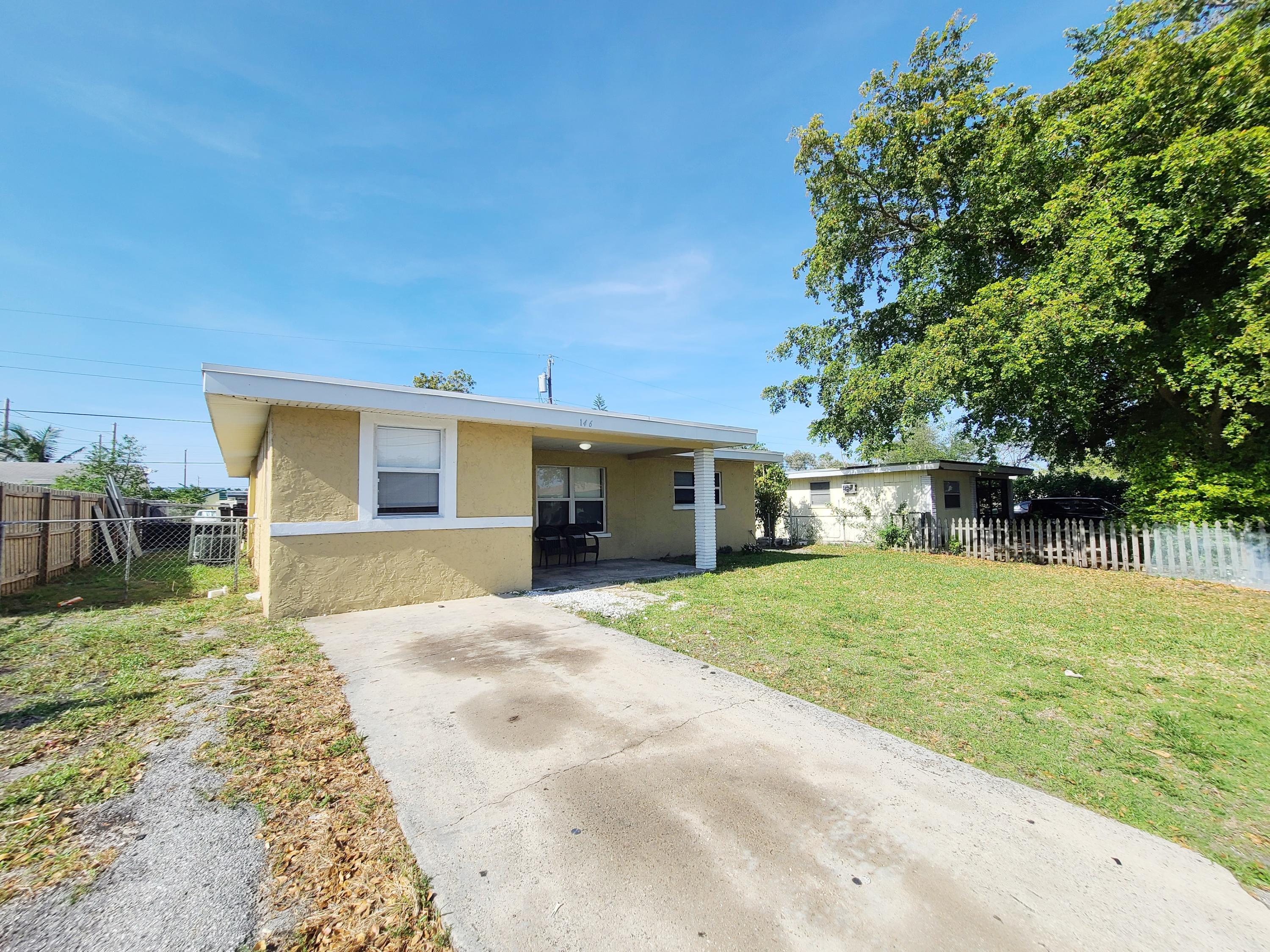 146 West 17th Street Riviera Beach, FL 33404 - Photo 2 of 18 Front View